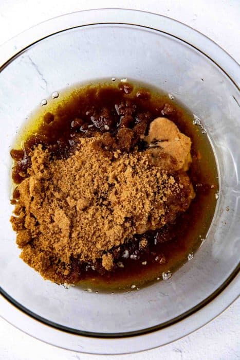 Brown butter added to the brown sugar in the bowl