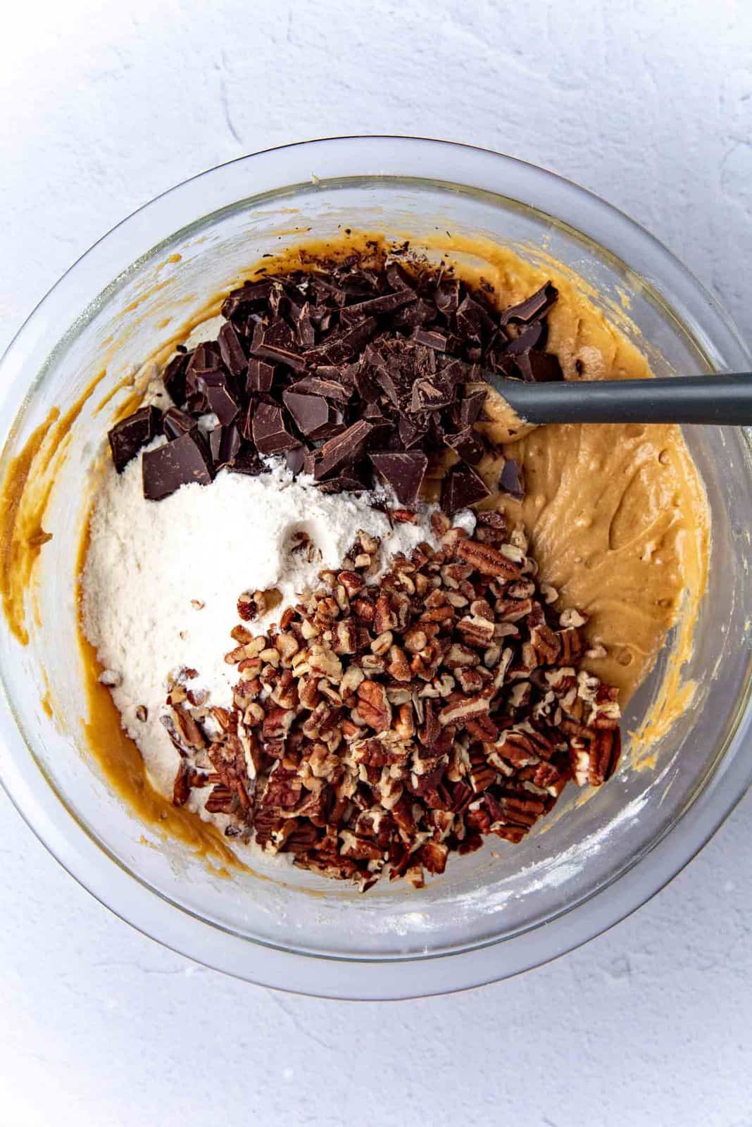 Adding the pecans and chocolate chunks