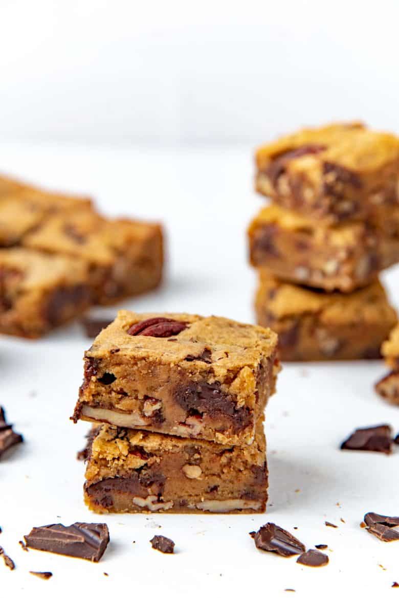 Brown butter blondies on a white table