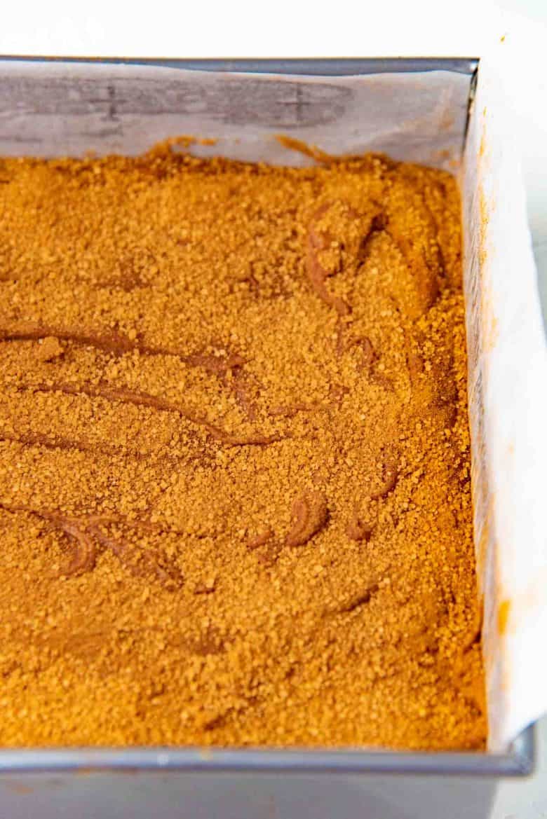 The surface of the blondies completely covered with cinnamon sugar mix