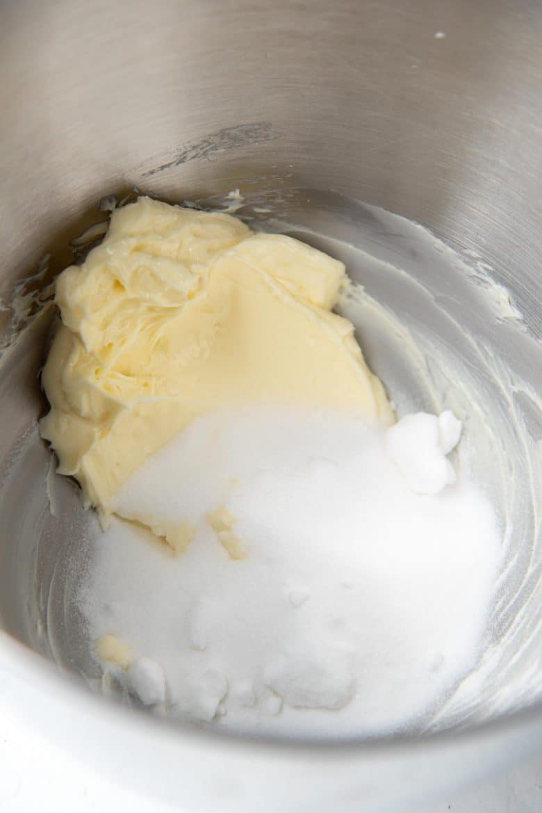 Butter and sugar together in a mixing bowl