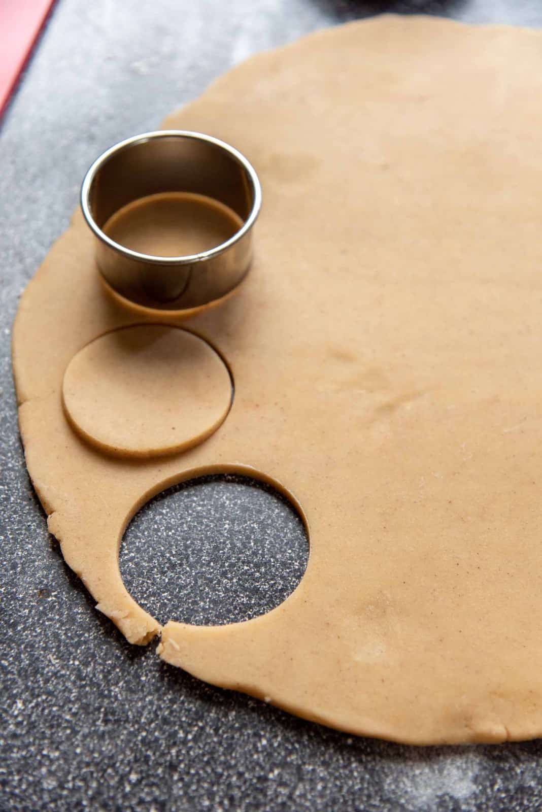 Cookie cutter, cutting out shapes in the rolled out dough