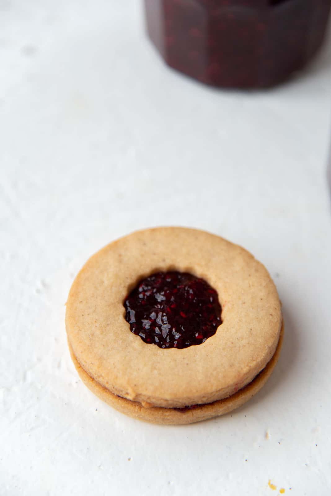 Topping it with a cookie with the center cut out