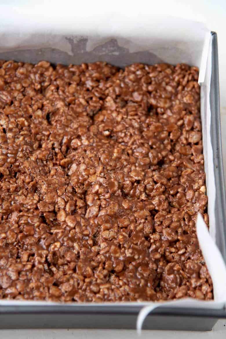 The Mars bar rice krispie layers pressed into the baking pan