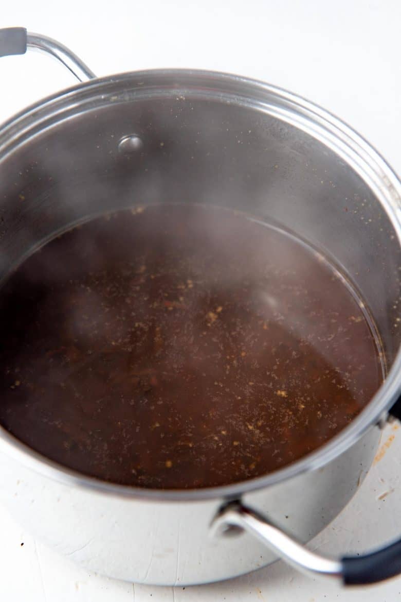Tea and spices in boiling water