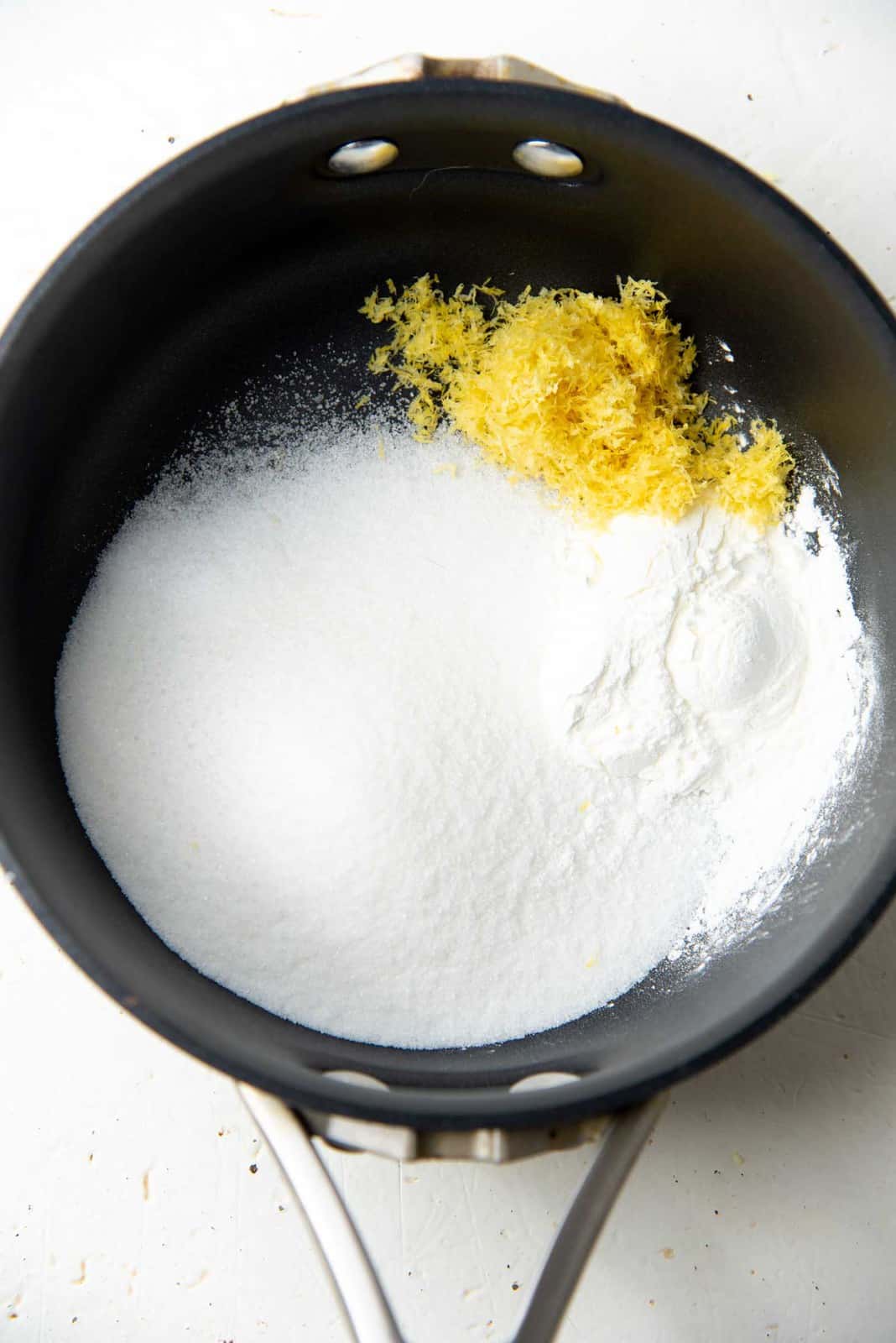 Sugar, cornstarch, and lemon zest in a saucepan to make the lemon curd.