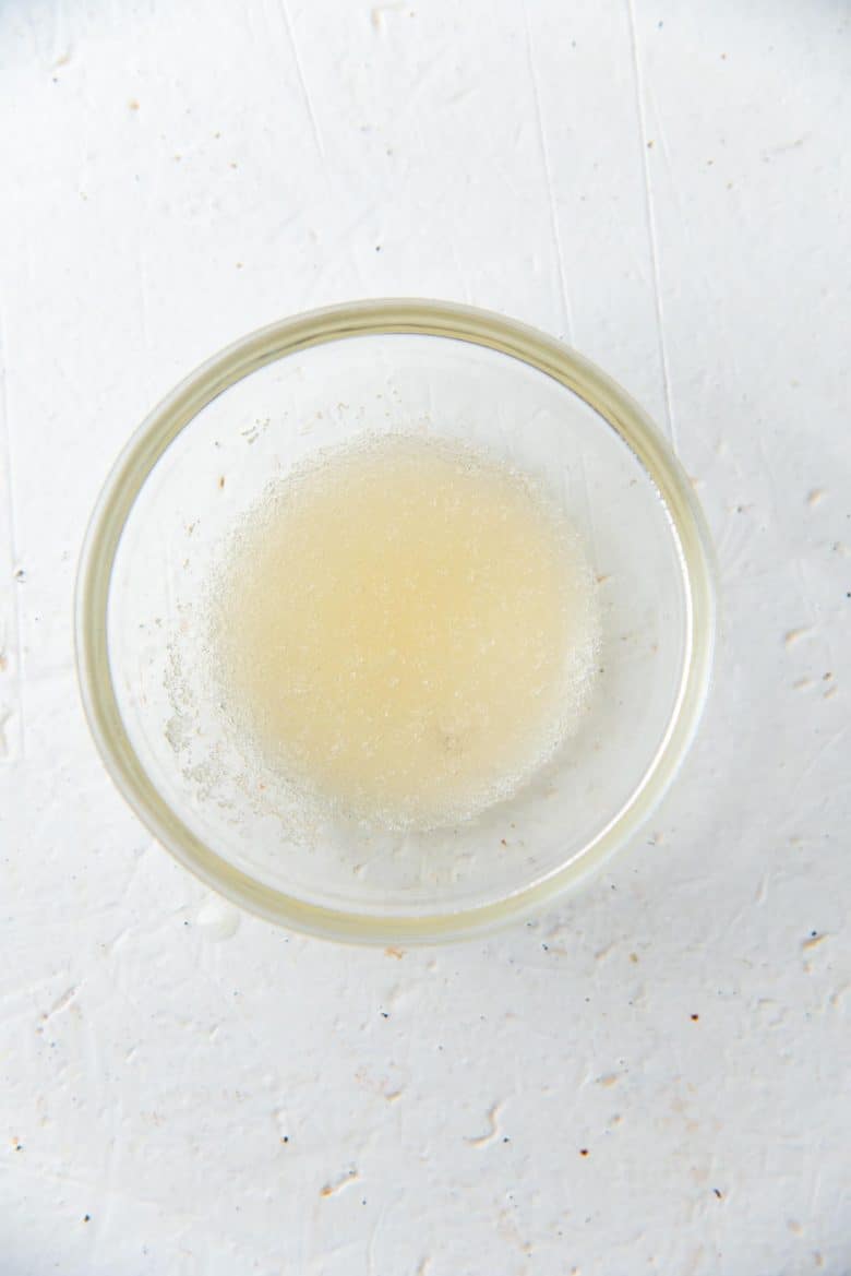 Bloomed gelatin in a small bowl