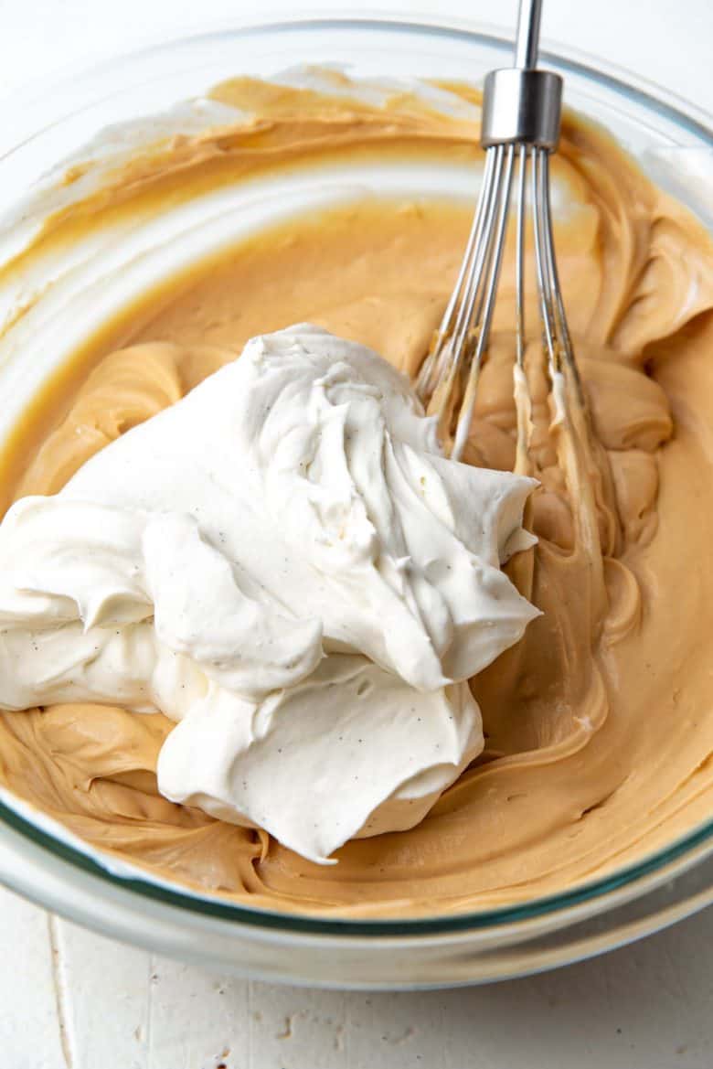 Folding in cream into the pastry cream