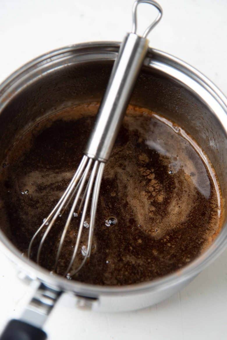 The brown sugar syrup in a small saucepan