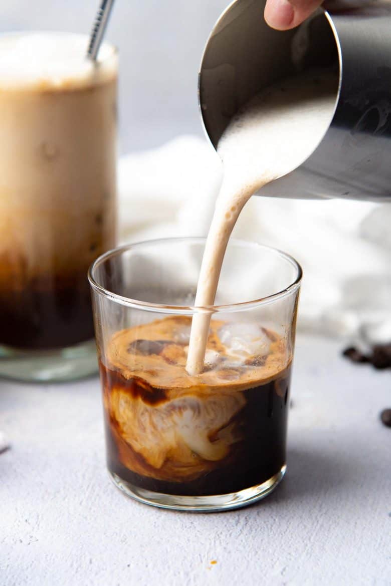 Brown sugar iced coffee in a small glass