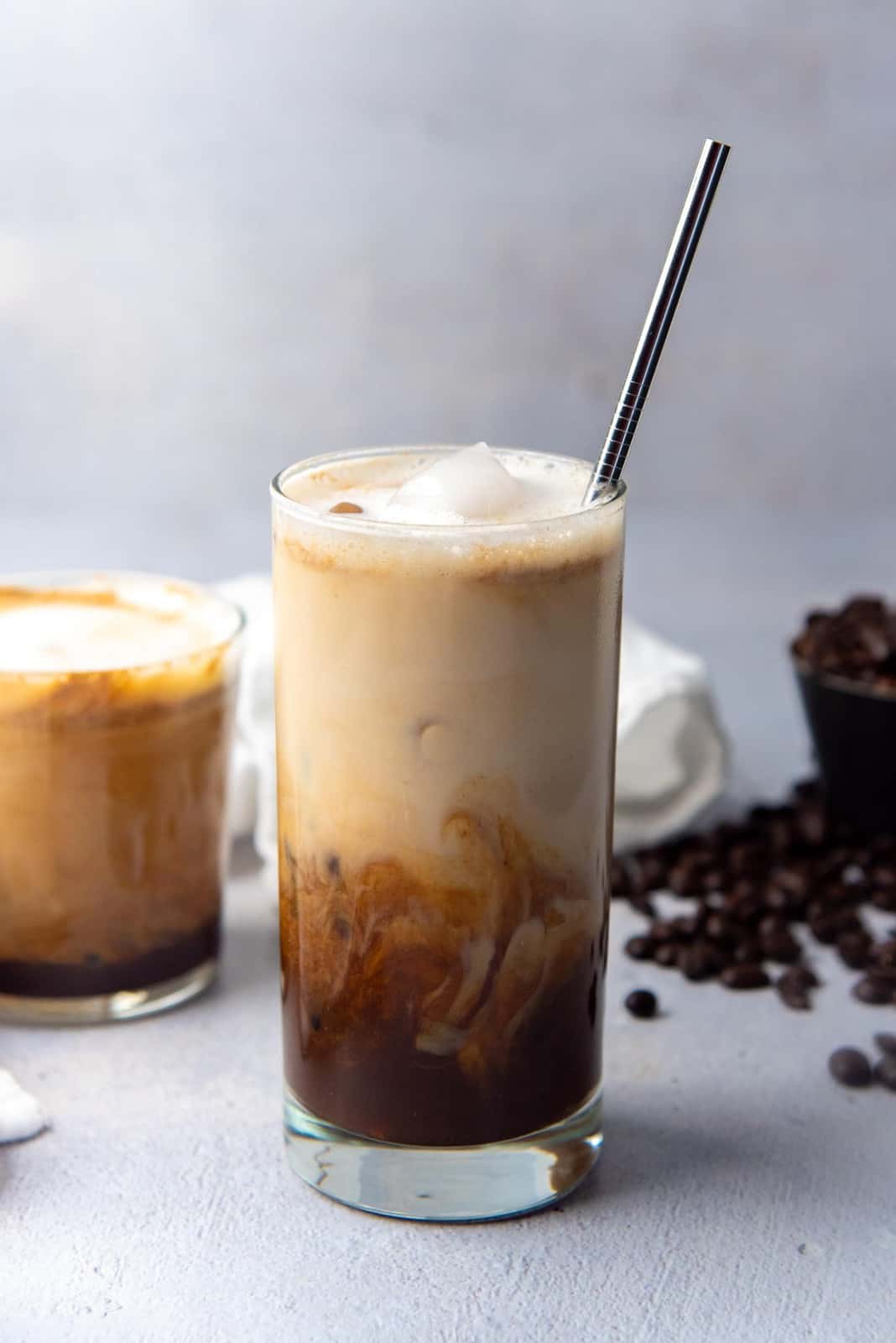 Iced brown sugar oat milk shaken espresso in a glass