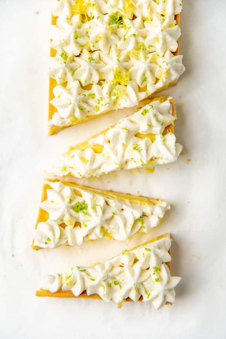The pina colada tart cut into triangles, overhead view