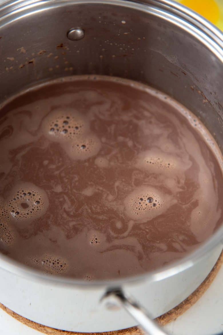 The milk, sugar and cocoa mixture in the saucepan