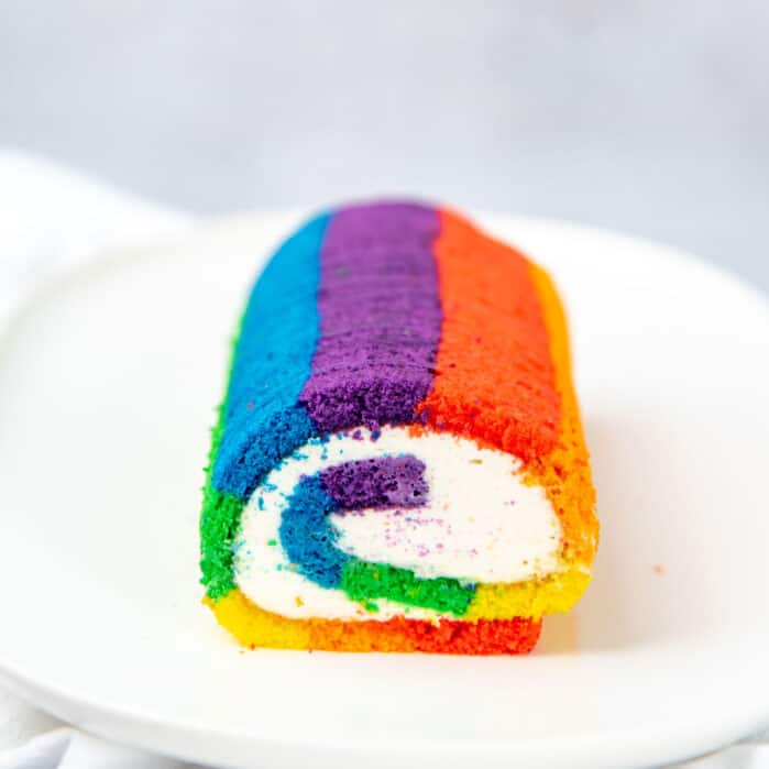 Rainbow swiss roll cake social media