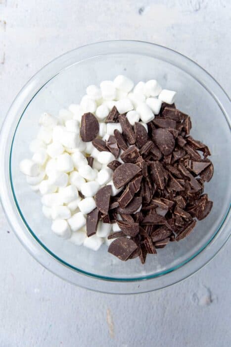 Chopped chocolate and mini marshmallows in a bowl