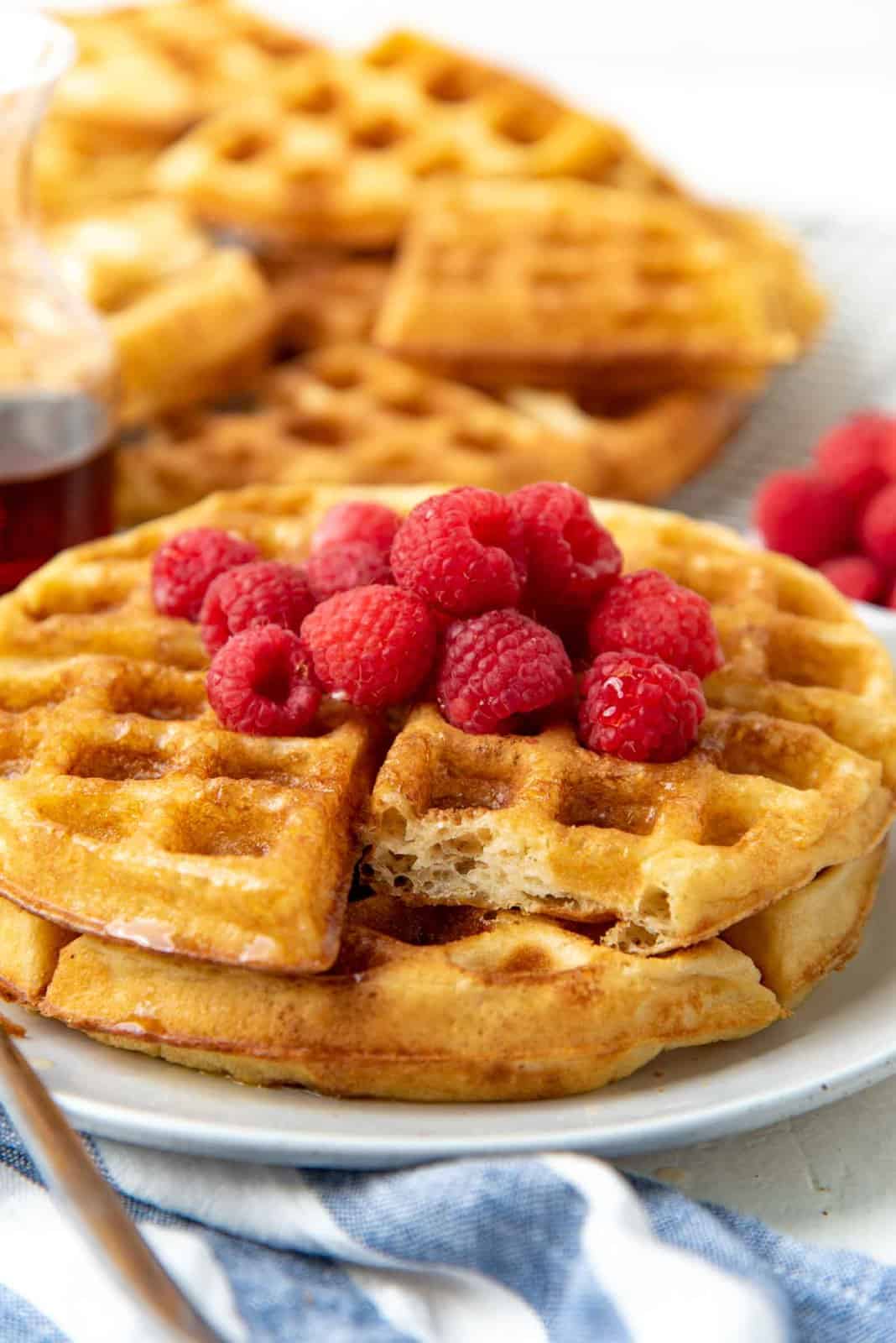 Overnight yeasted waffles served on a plate