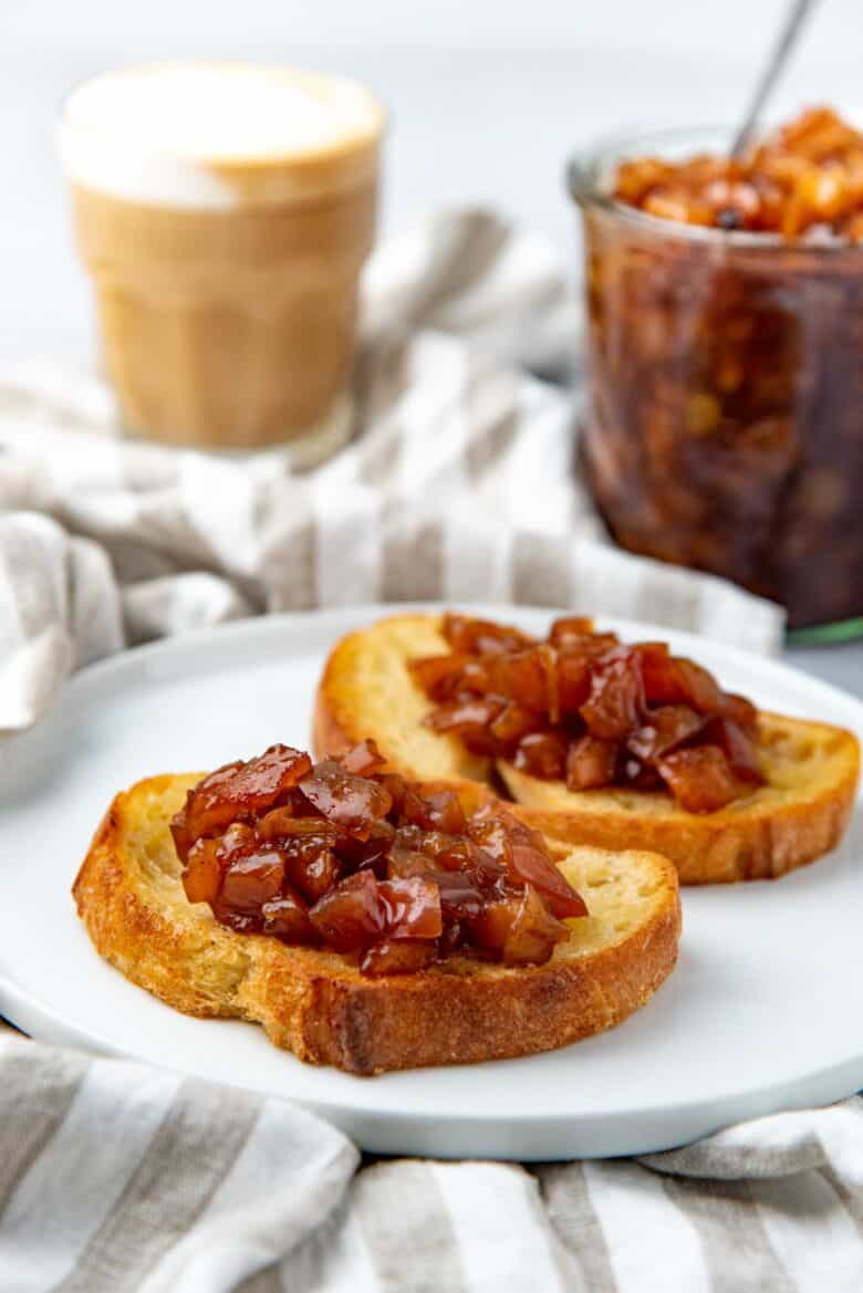 Two slices of toast topped with caramel apple compote