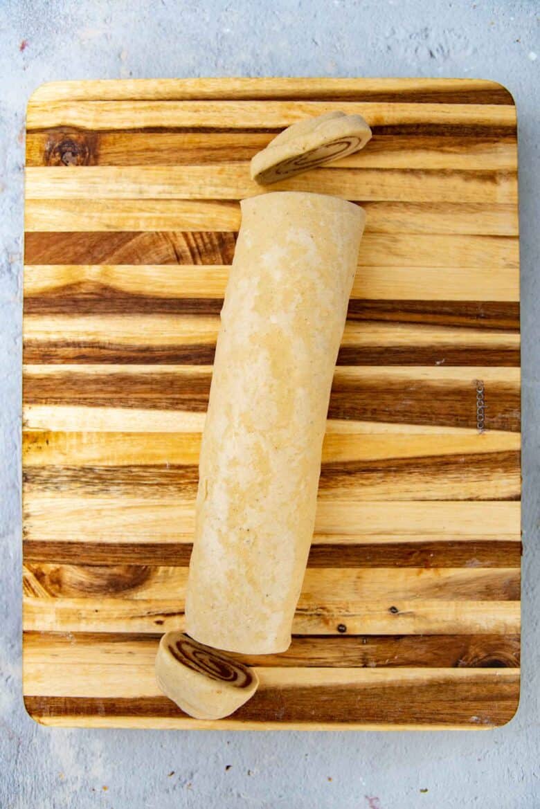 Rolled up cinnamon dough, with the edges trimmed