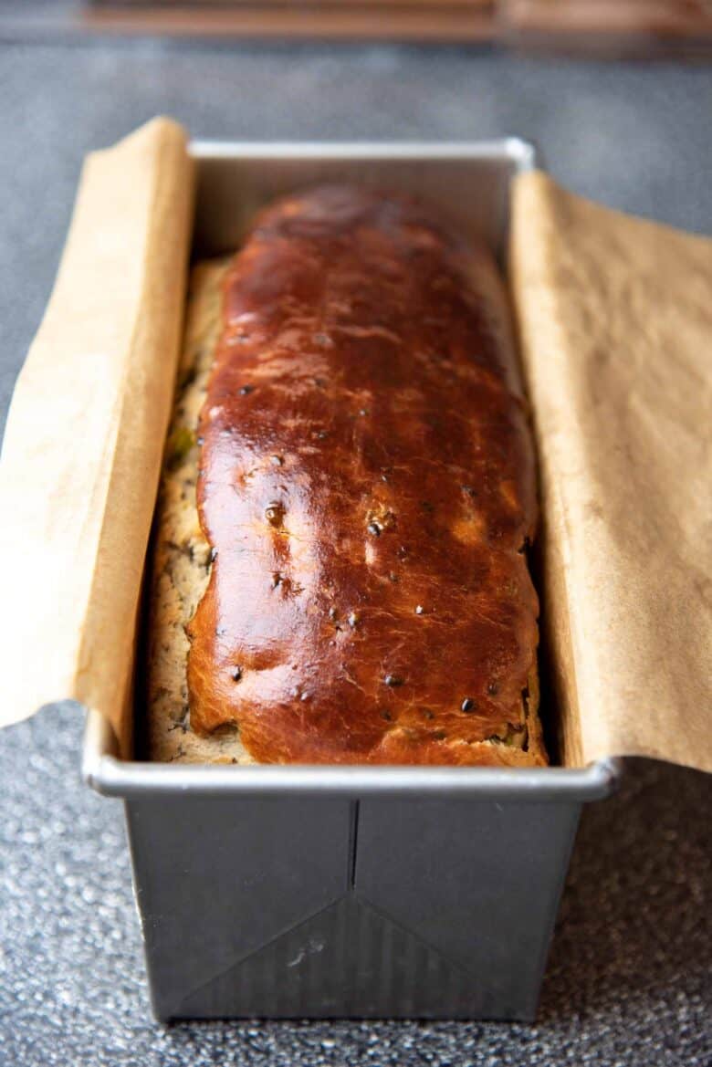 Freshly baked loaf of bread in the loaf pan