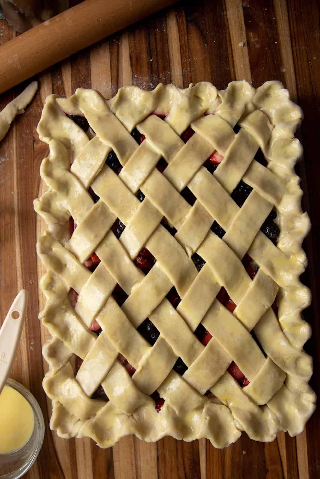 A slab pie with the edges crimped.