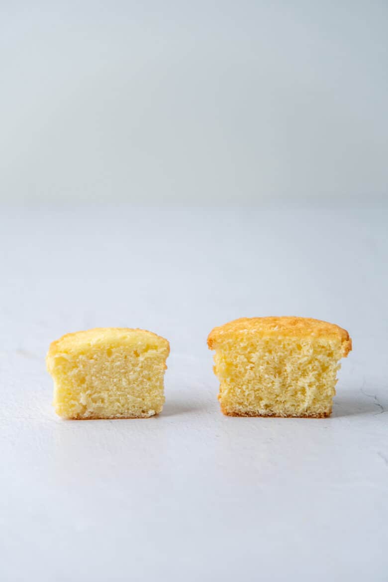Two cupcakes cut in half to show the crumb in the cake.