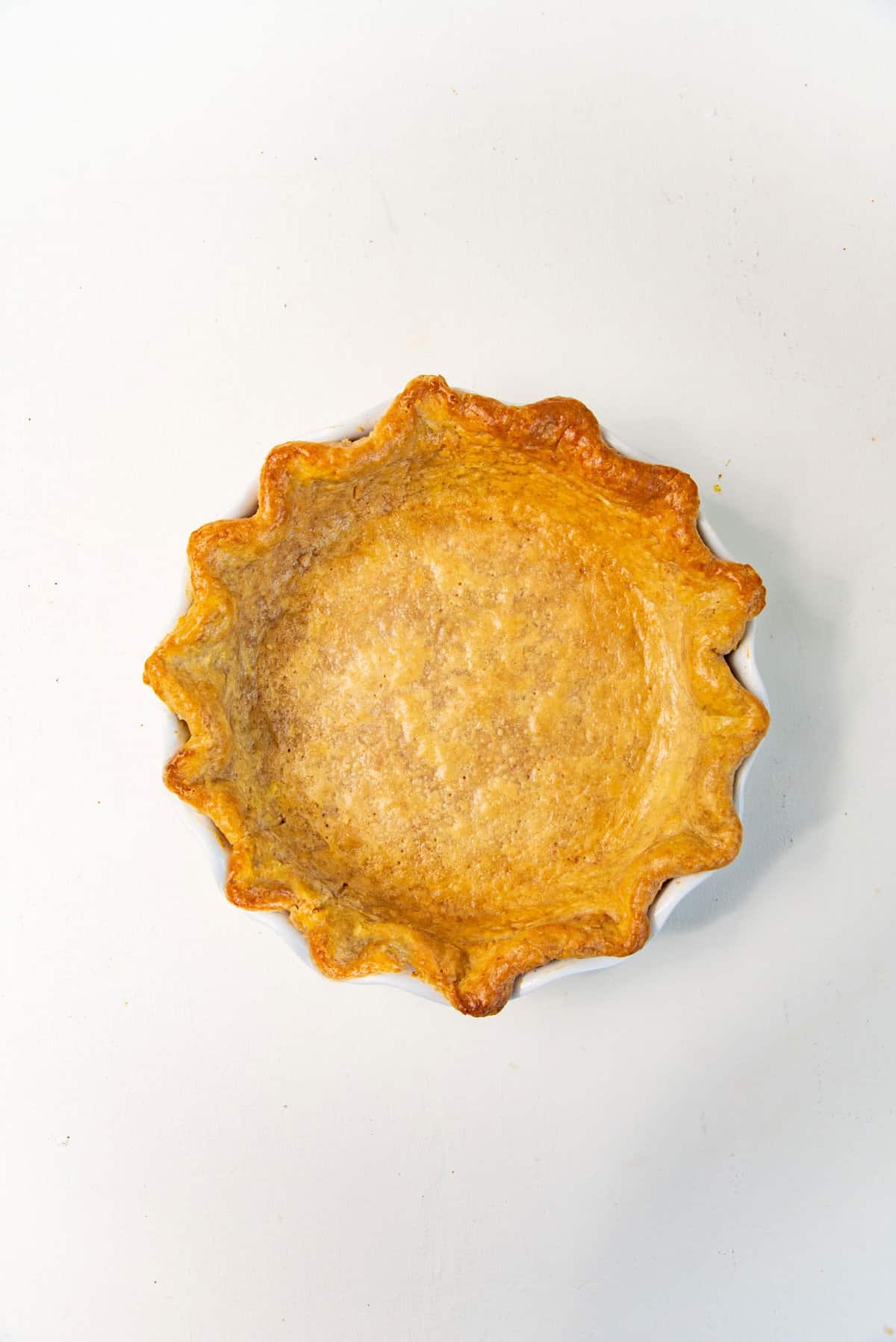 A single blind baked flaky graham cracker pie crust.