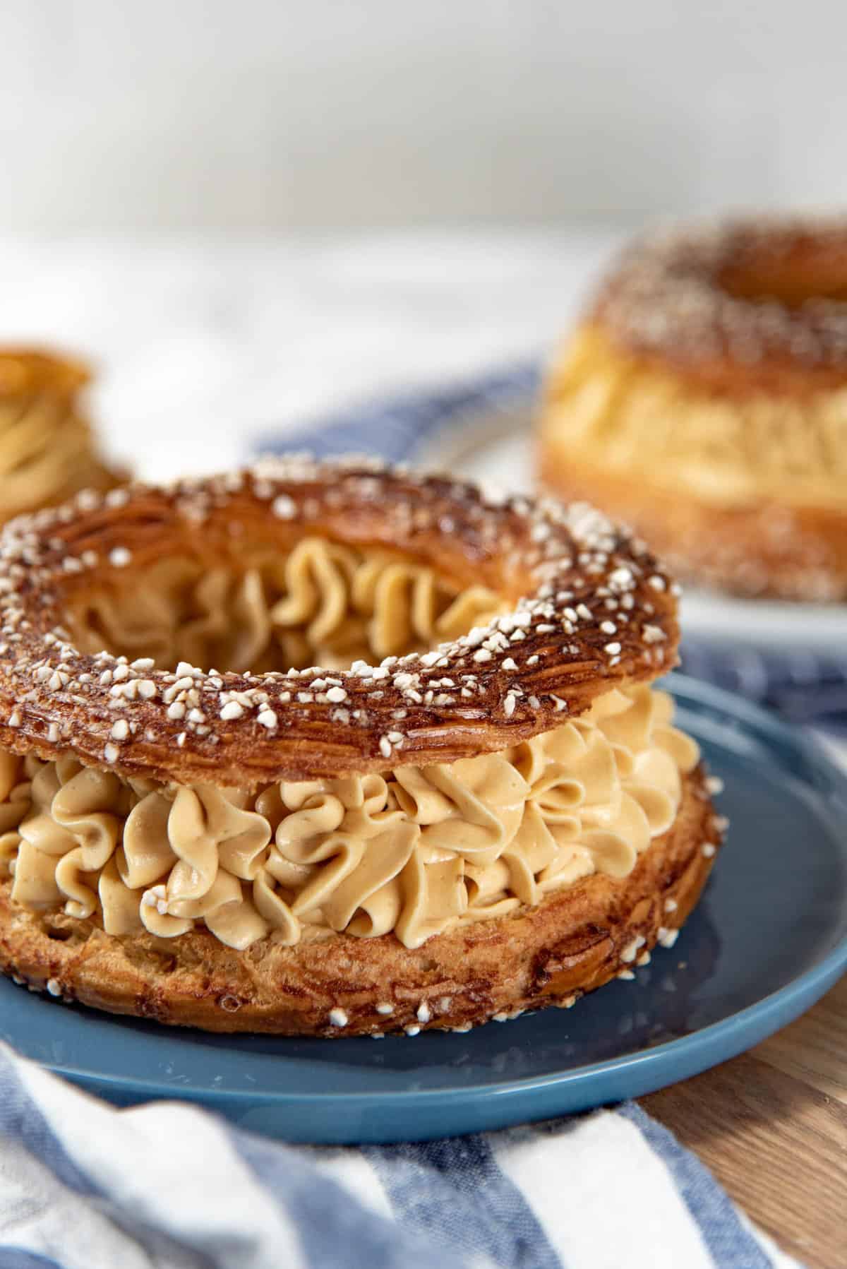 A close up of the Paris Brest pastry, filled with the mousseline cream