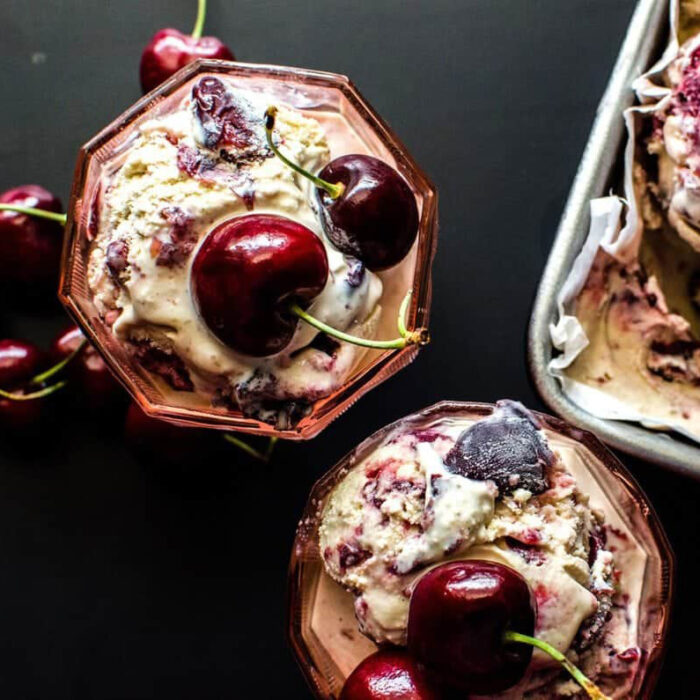 Kahlúa cherry ice cream with chunks of sweet cherry swirled through the ice cream served in small ice cream cups.